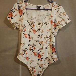 Rue21 Tops - Floral one piece bodysuit Rue21 Tops - Floral one piece bodysuit